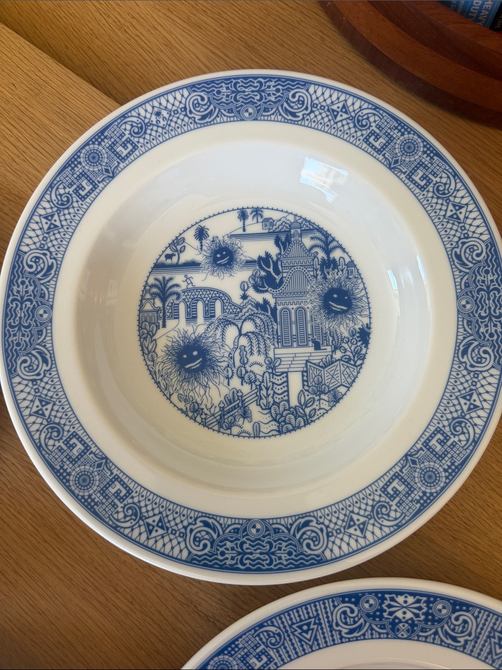 Set of 4 Blue & White Ceramic Soup Bowls with Whimsical Designs - Picture 6 of 13